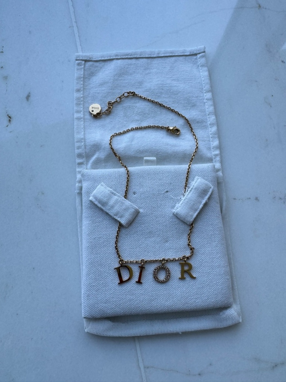 Dior Gold-Tone Letter Charm Necklace with 'DIOR' Pendant